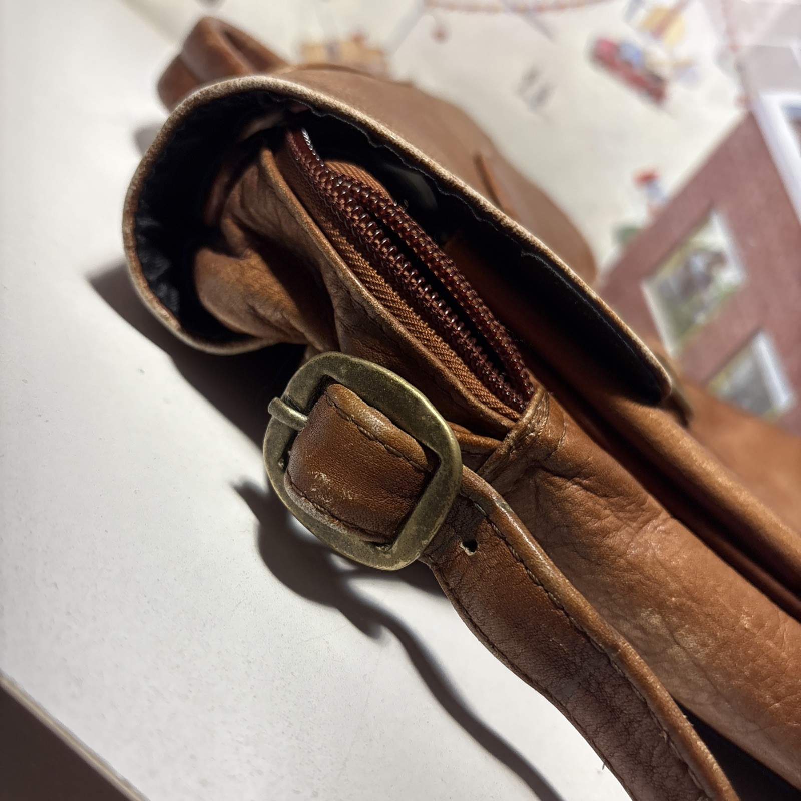 Vintage Wilsons Leather Crossbody Bag with adjustable strap and five pockets