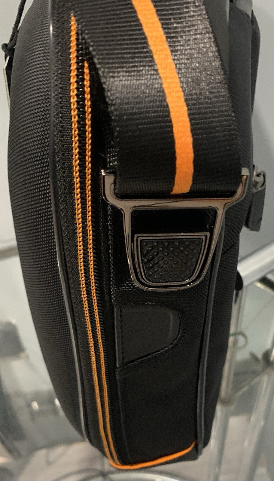 TUMI MCLAREN Axle Slim Brief $1095 Black/Orange