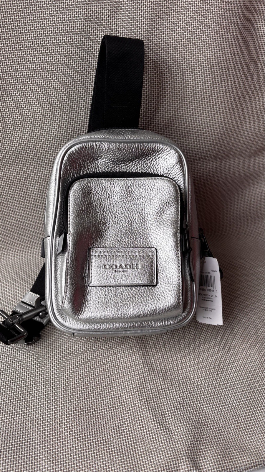 Coach Track Pack 14 in Metallic Ash.