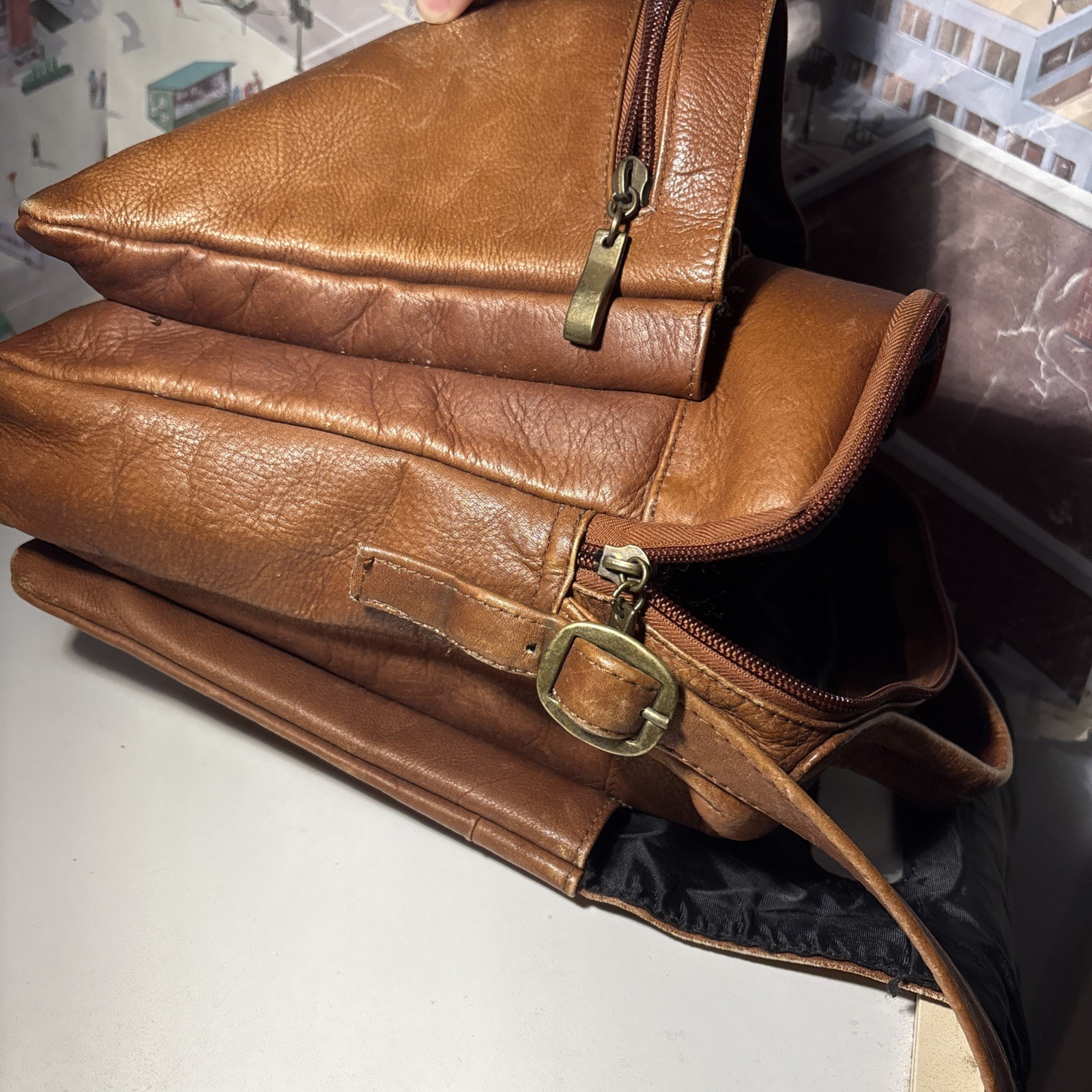 Vintage Wilsons Leather Crossbody Bag with adjustable strap and five pockets