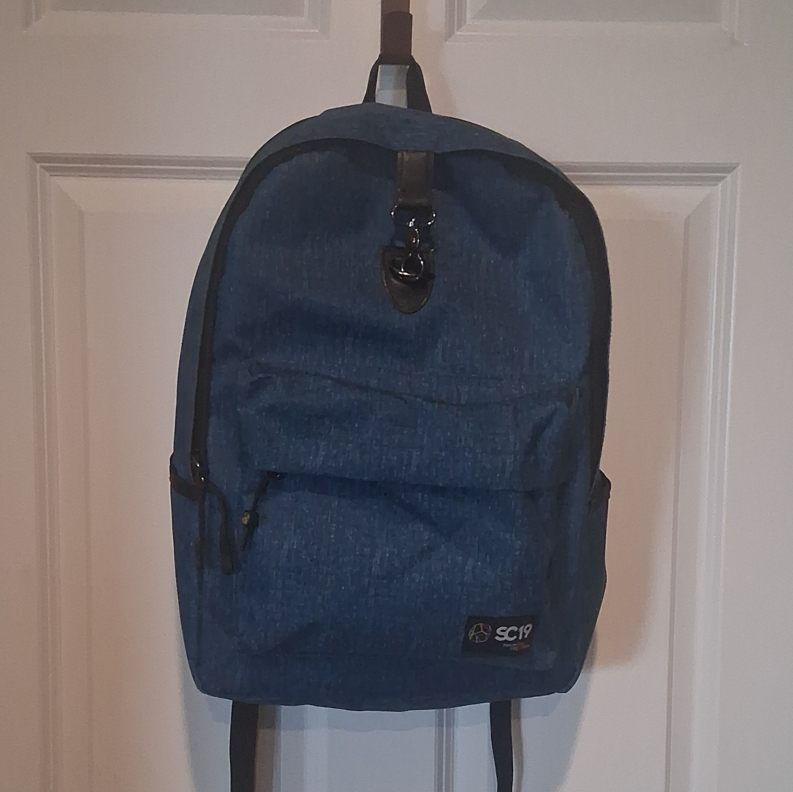 SC19 Blue Backpack Bluetooth Port Padded Adjustable Strap Zip Closure w/ Buckle