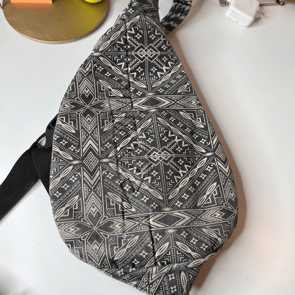 This item is a KAVU Rope Bag with a geometric black and white design