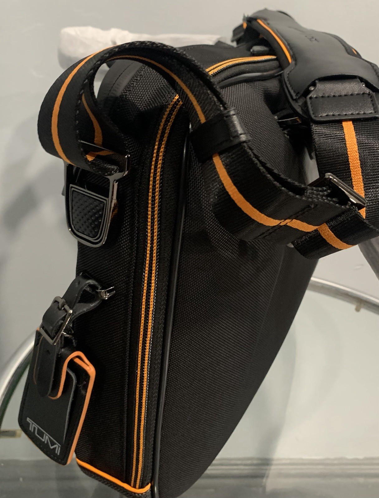 TUMI MCLAREN Axle Slim Brief $1095 Black/Orange