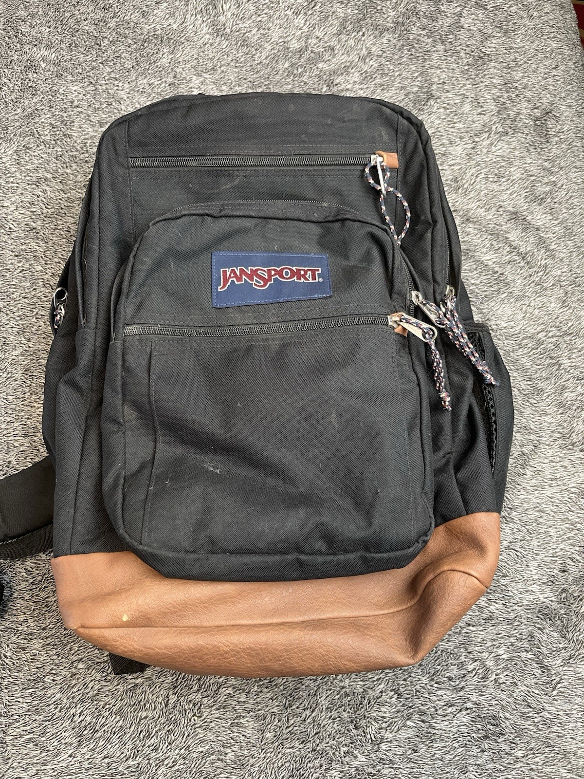JanSport College Student Backpack Black/Brown Synthetic Leather Bottom W/flaws