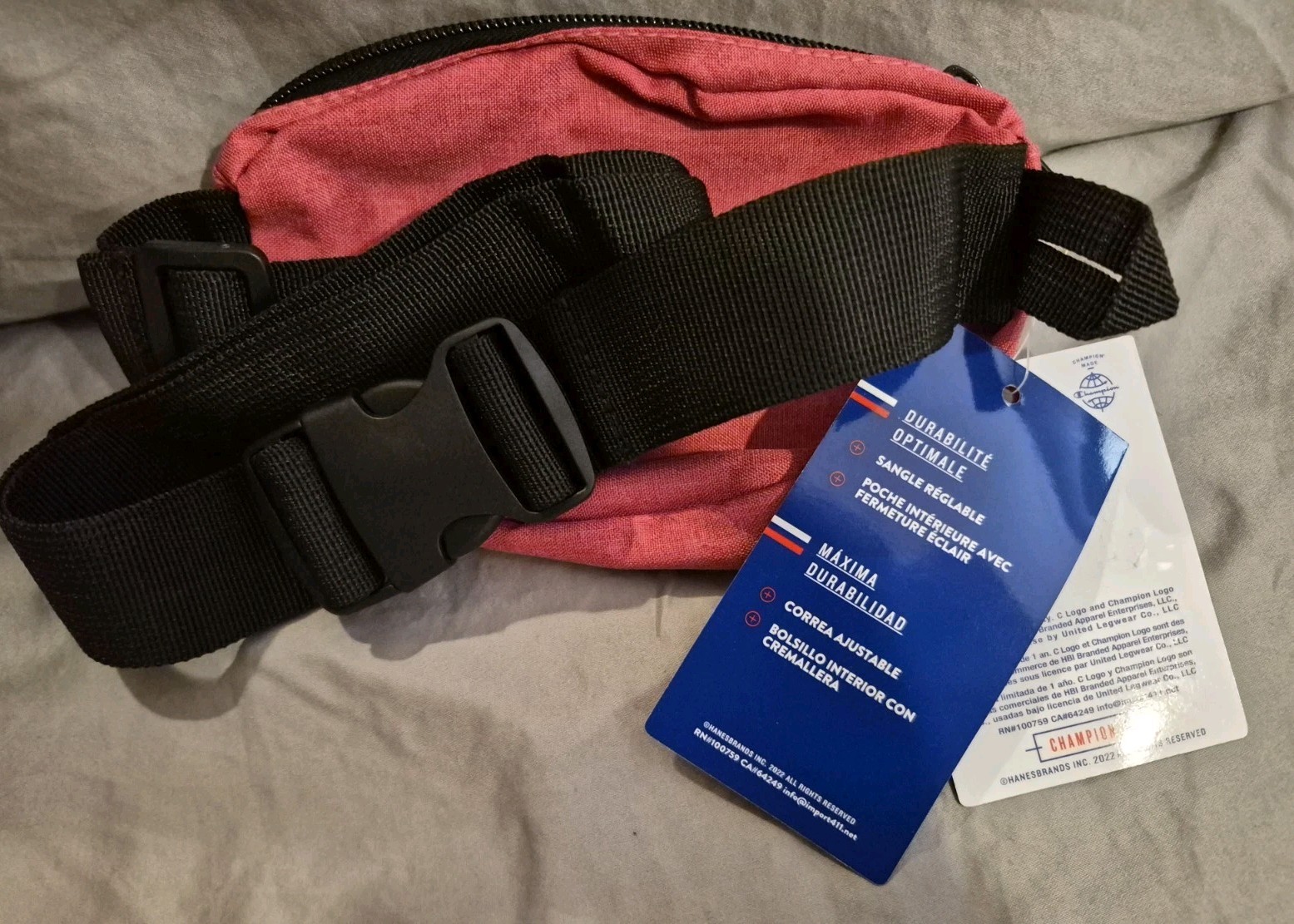 A brand new with tags Champion small sized fanny pack one size fits most