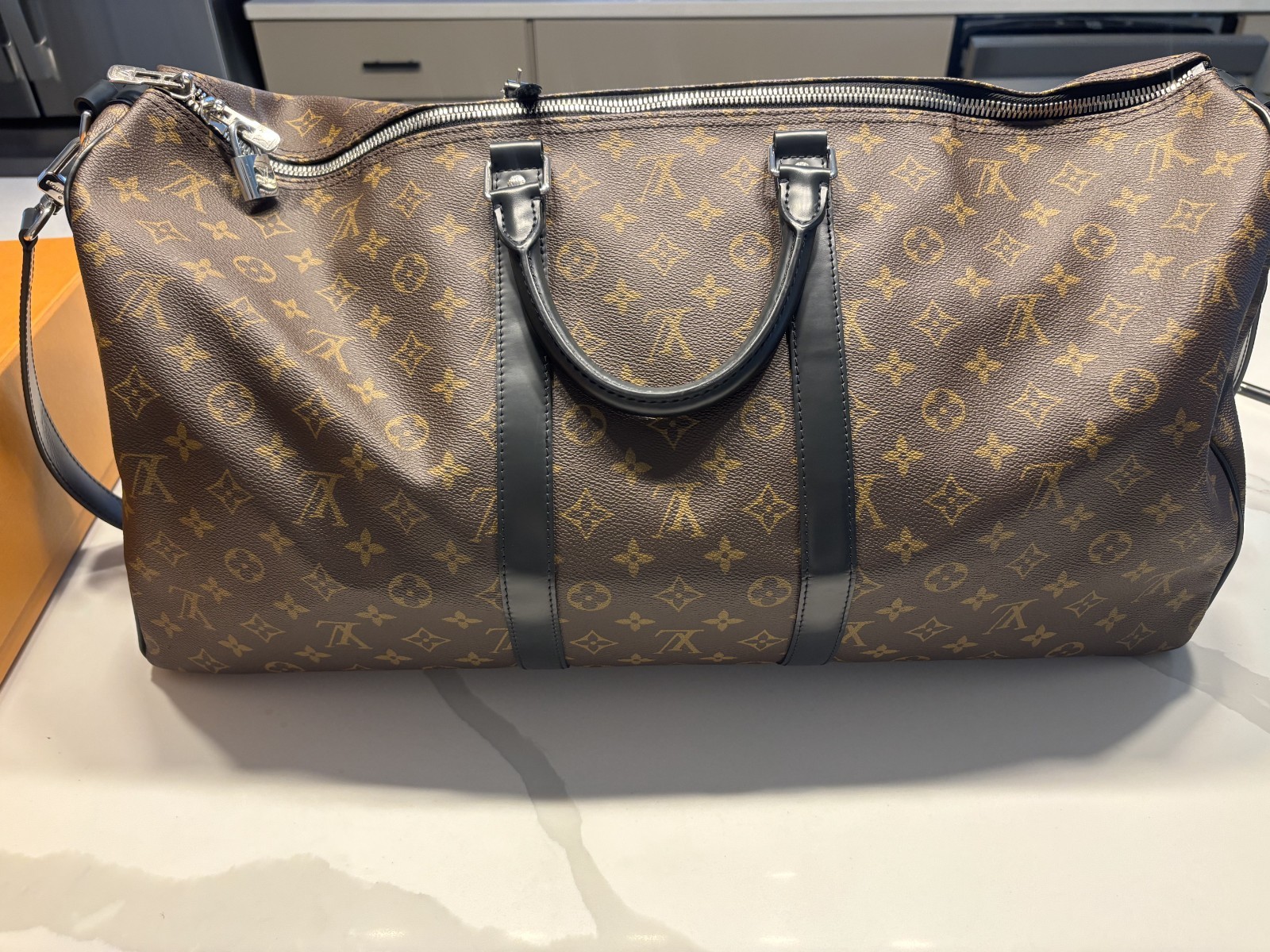 LOUIS VUITTON Keepall Bandoulière 55 in Monogram Macassar Canvas & Leather