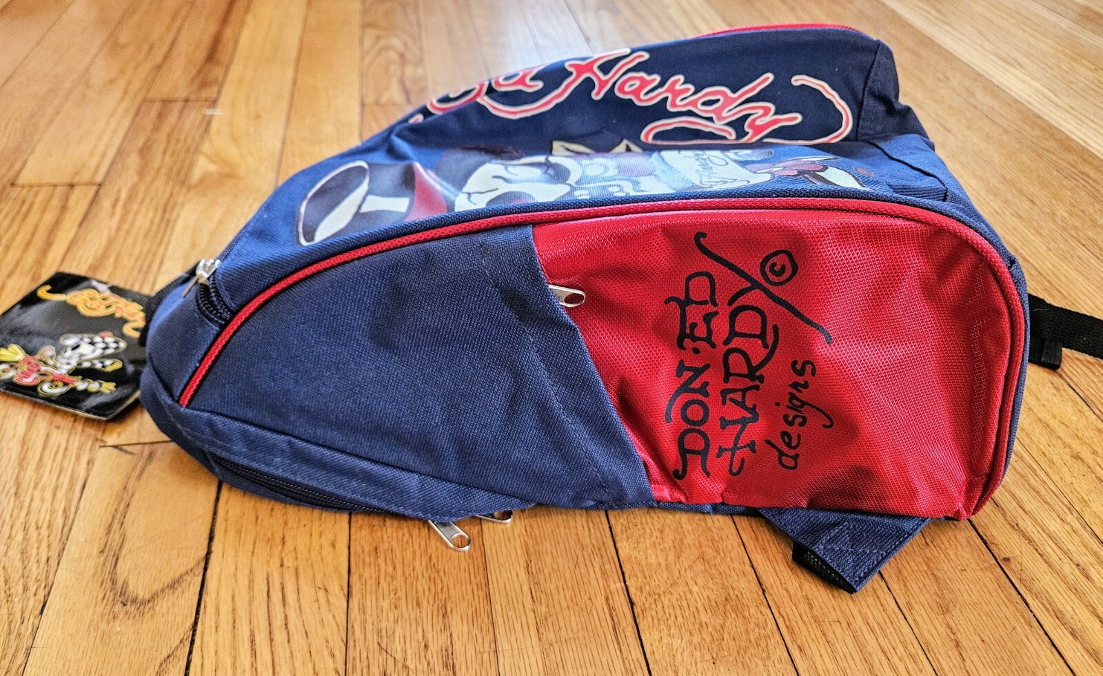 DON ED HARDY Skull With Top Hat Zip Top Carry Loop Backpack Navy & Red Unisex
