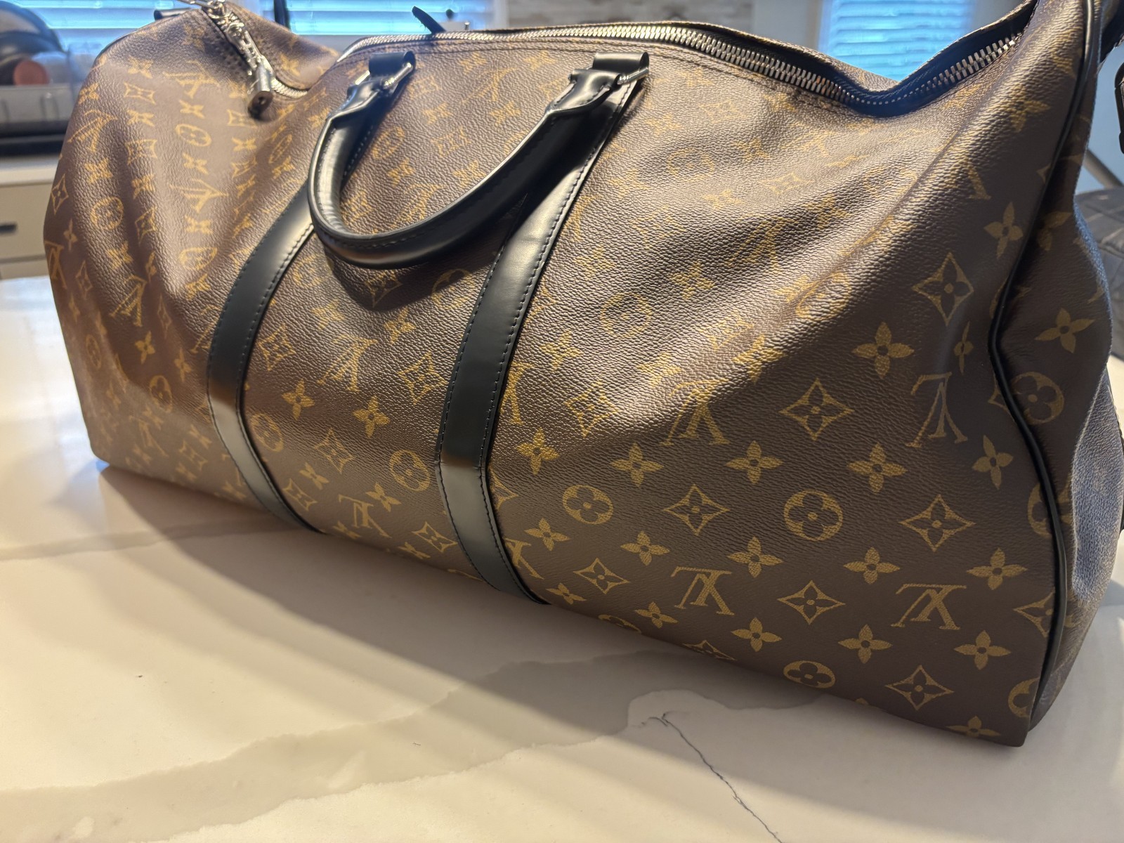LOUIS VUITTON Keepall Bandoulière 55 in Monogram Macassar Canvas & Leather