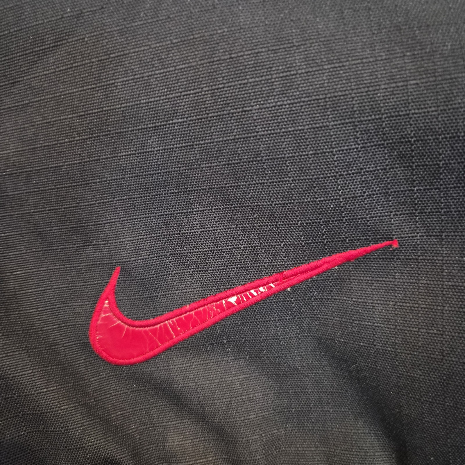 Retro Black and Red Nike Hoops Backpack Holds a Basketball