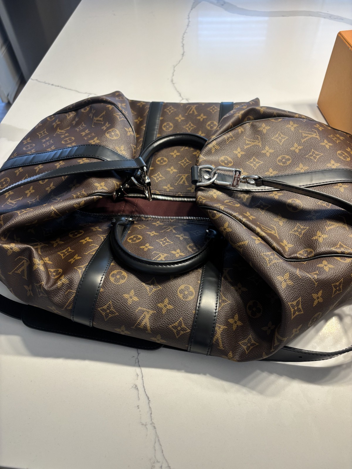 LOUIS VUITTON Keepall Bandoulière 55 in Monogram Macassar Canvas & Leather