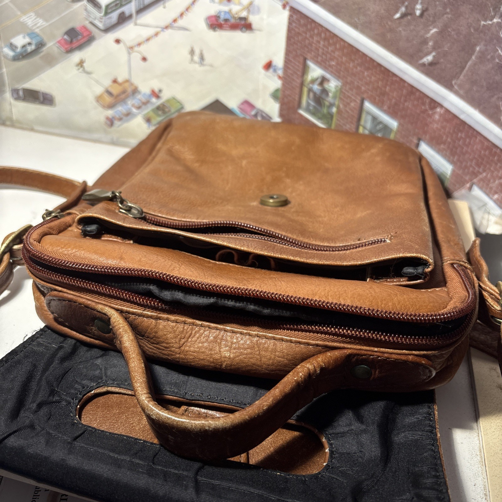 Vintage Wilsons Leather Crossbody Bag with adjustable strap and five pockets