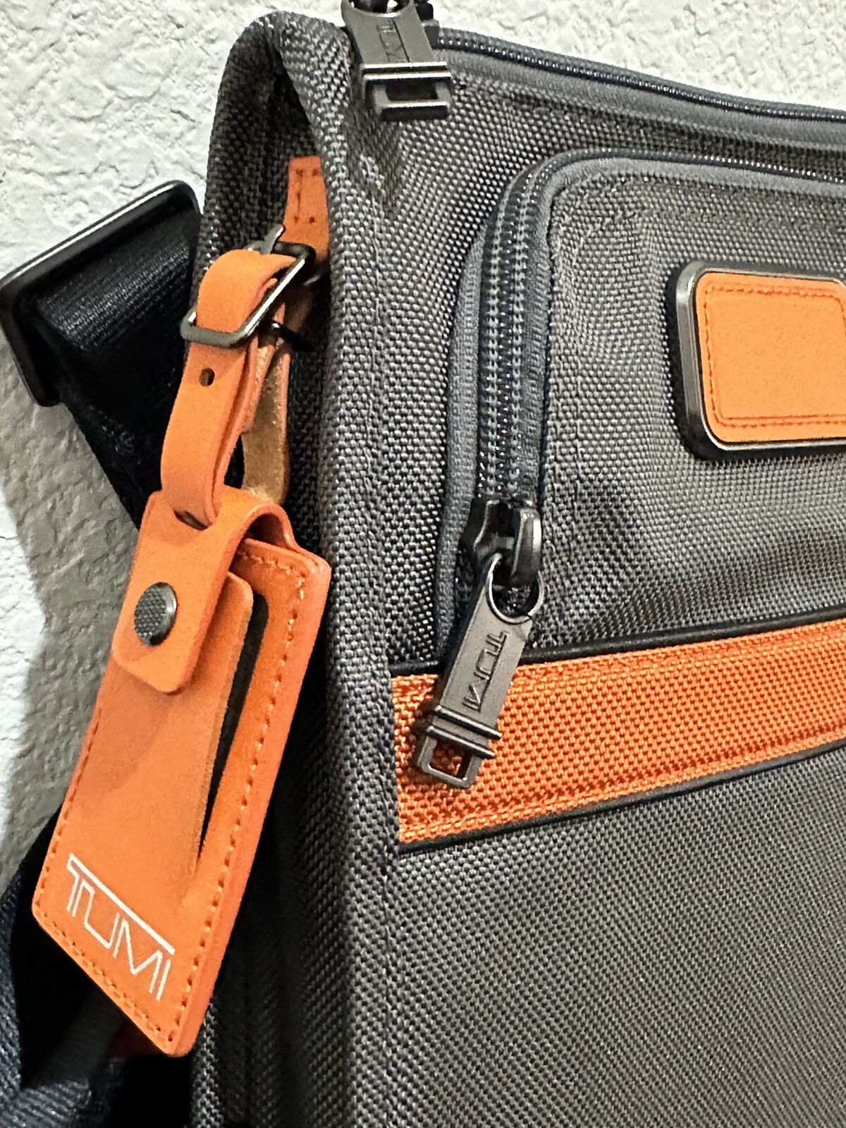 NWT TUMI Pocket Bag Small Crossbody Charcoal Orange