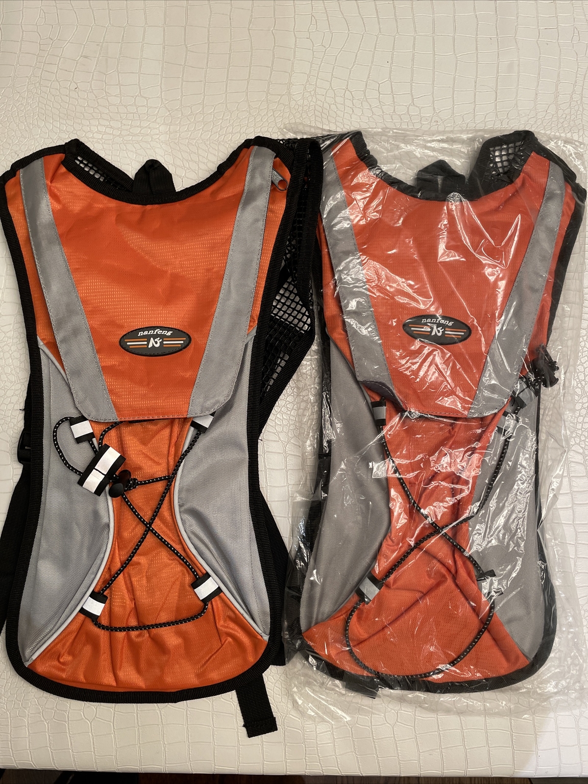 2 X Nanfeng black and Orange hydro packs. Brand New, But No Bladder Included.