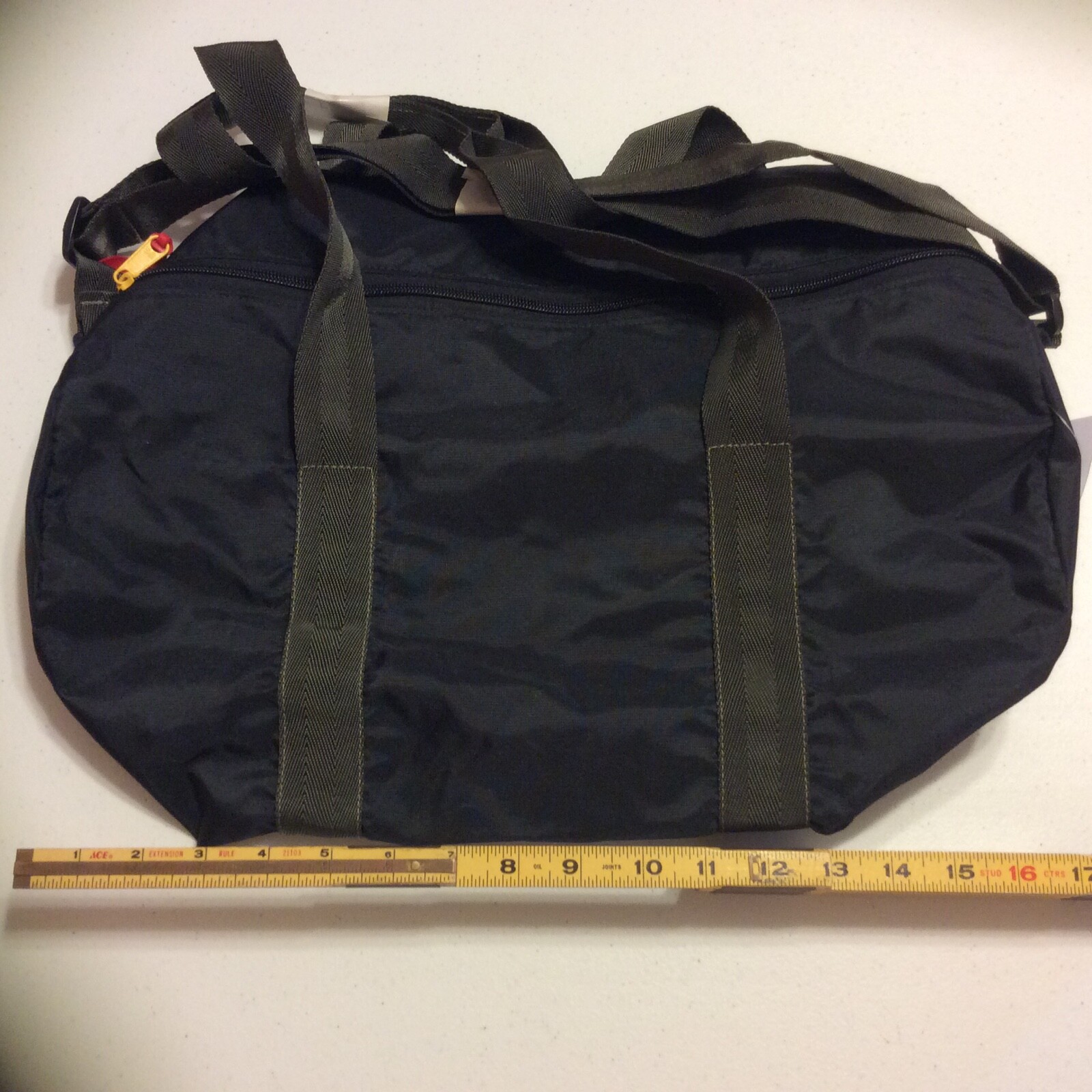 Filum black duffle bag 8”x7”x16” New with tags Water resistant