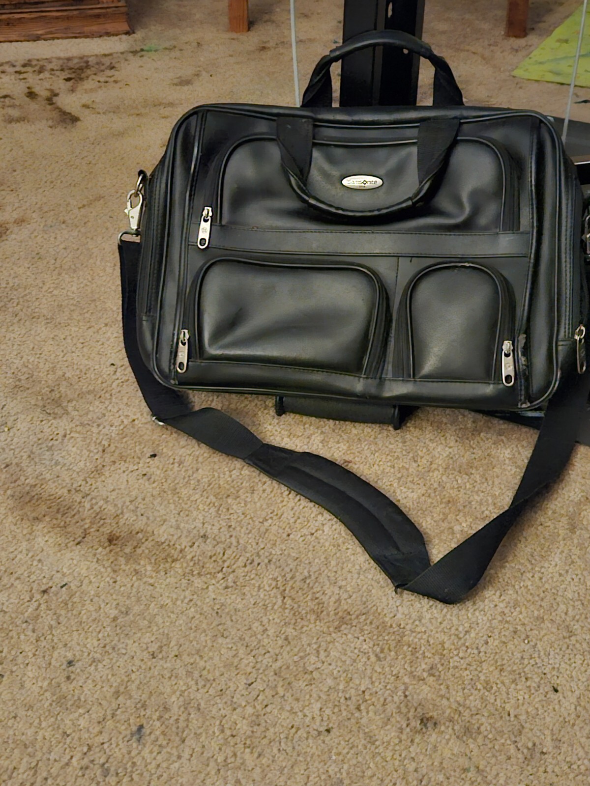 Samsonite Travel Bag. With many compartments, and very strong and rugged.