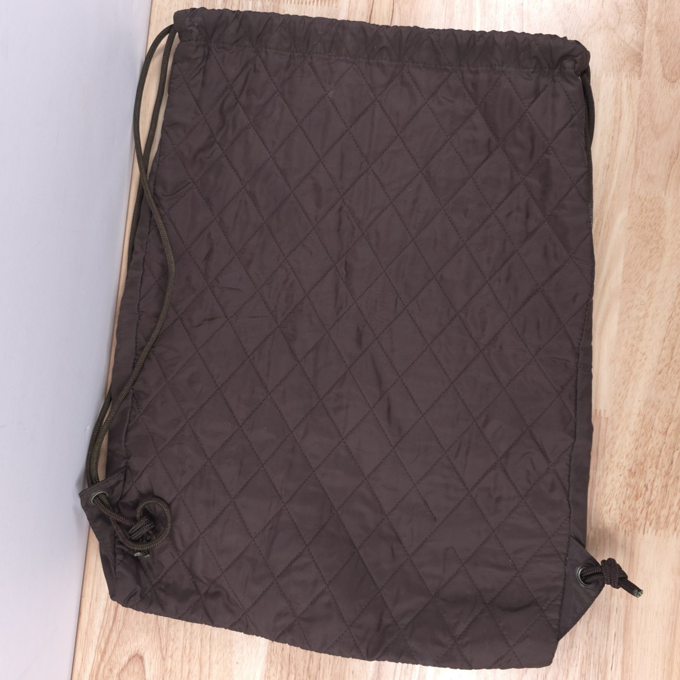 The North Face Quilted Drawstring Bag — Brown