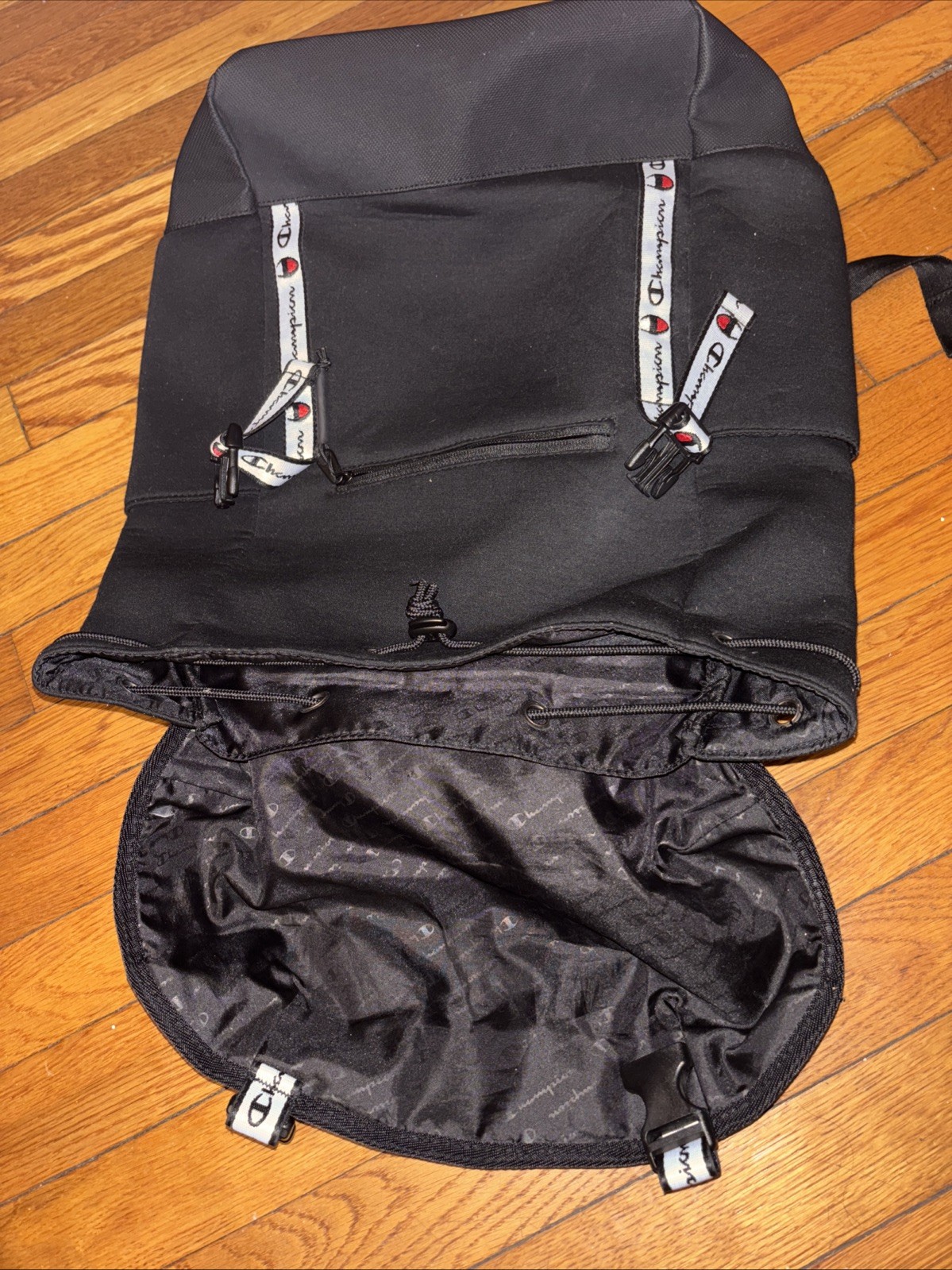 Champion Black Backpack Drawstring Buckle Adjustable Strap Front Pocket